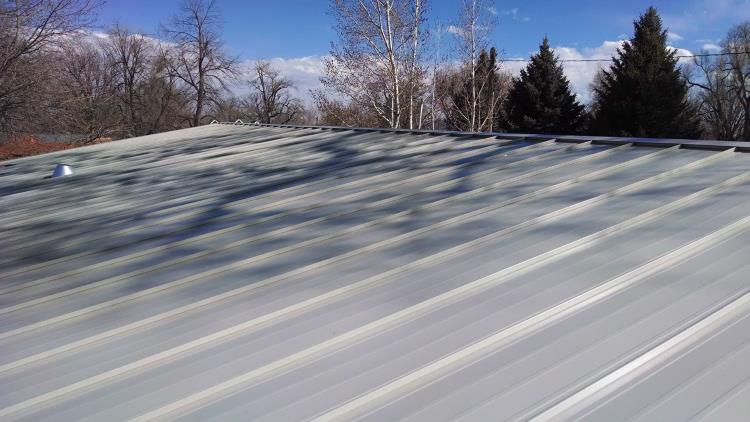 A much larger metal roof with overlapping metal strip type sheeting, from Mr Money Mustache.
