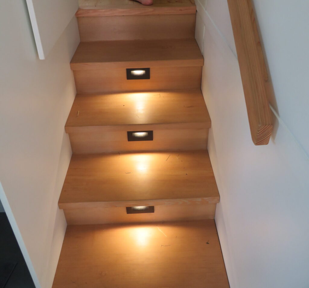 lit-stair-well-to-bedroom-loft-tiny-home