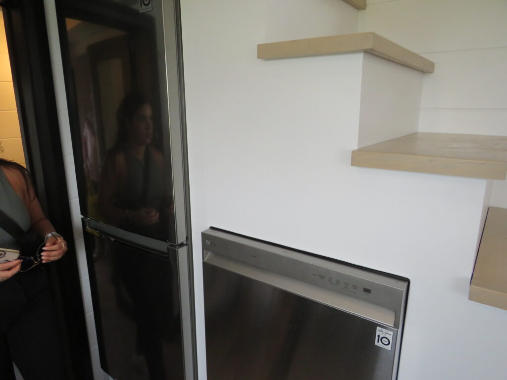 built in fridge and washing machine under the stairs